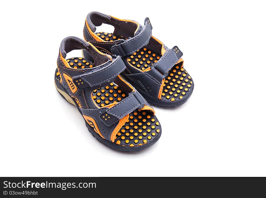 A pair of child's shoes on white background with good clipping path