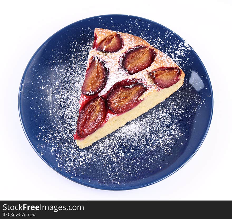 Plum Pie - a piece on a blue plate