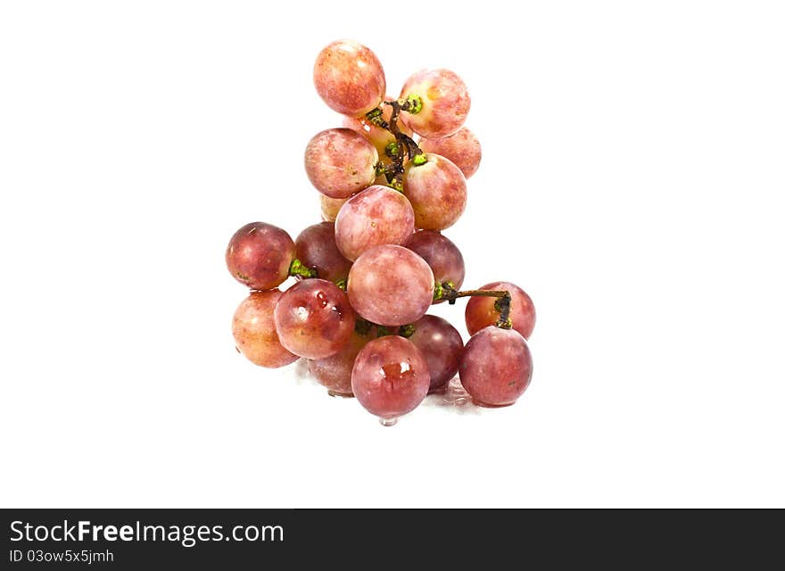 A bunch of red grapes. Place isolated on white background.