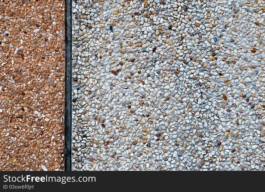 White gravel and concrete wall