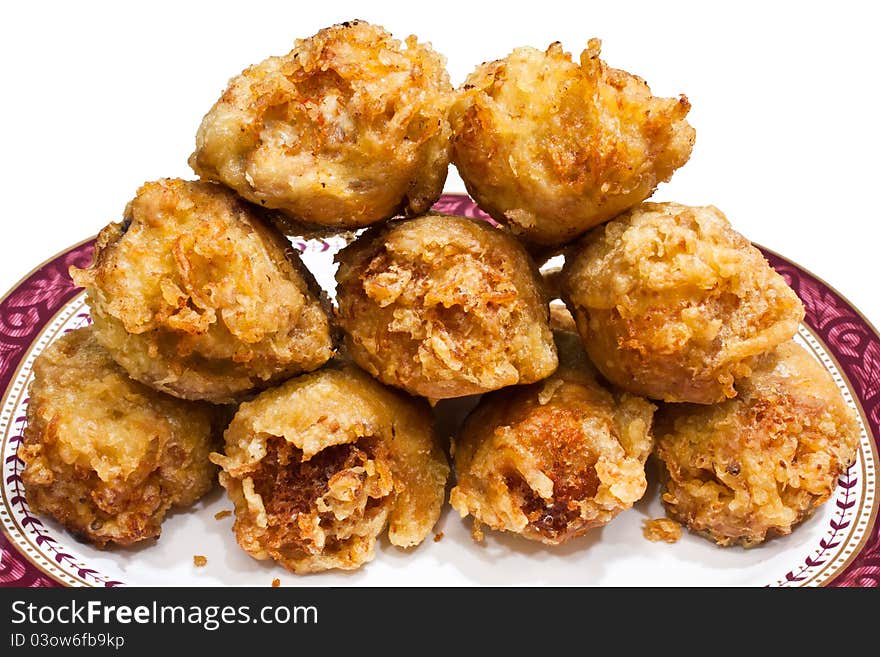 Several pieces of fried chicken leg. Arranged on the plate. Several pieces of fried chicken leg. Arranged on the plate.