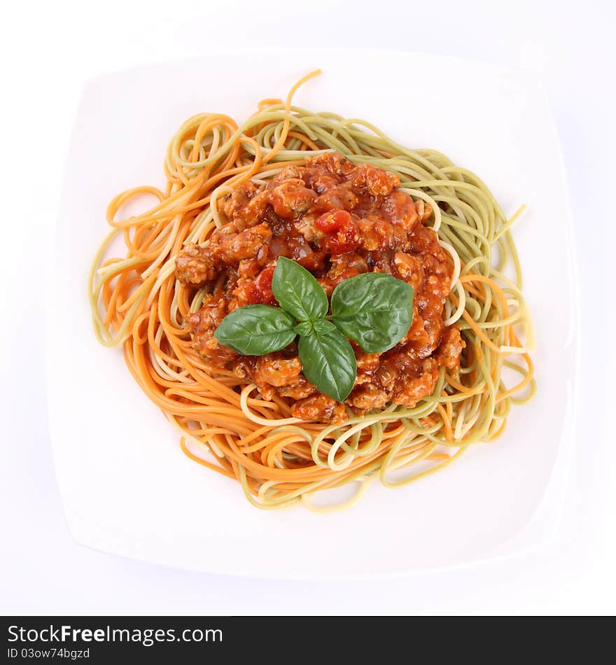 Colorful Spaghetti bolognese on a plate