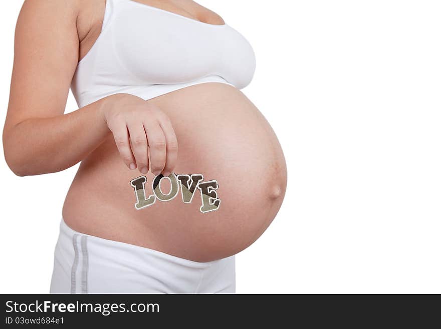 Pregnant woman hold word love on in hands on white background. Pregnant woman hold word love on in hands on white background