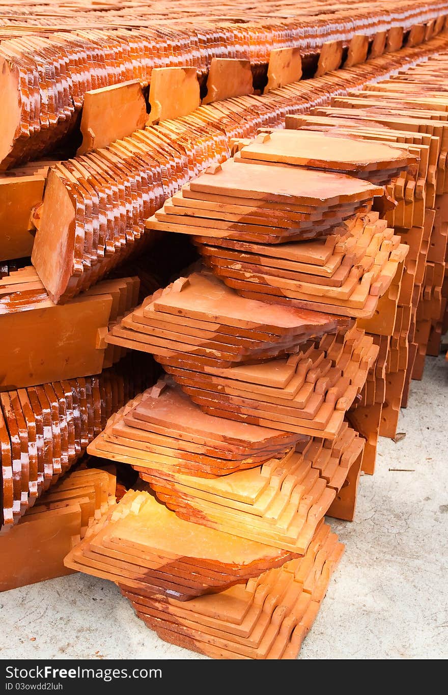 Stack of ceramic roof tiles for make Thai Church