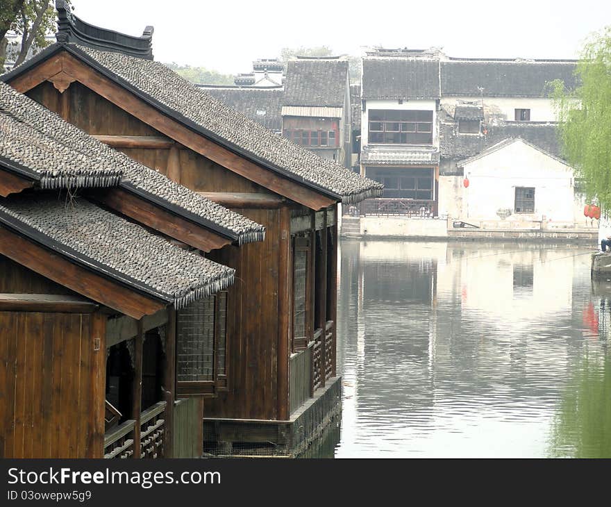 Tongli, one of the most famous water townships in China, Its intricate maze of canals and traditional houses of the villagers along canals are very unique scenery. Tongli, one of the most famous water townships in China, Its intricate maze of canals and traditional houses of the villagers along canals are very unique scenery.