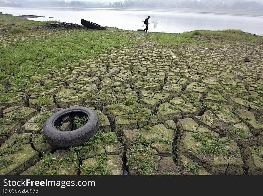 Structure of dry land on the shore of the pond. Structure of dry land on the shore of the pond