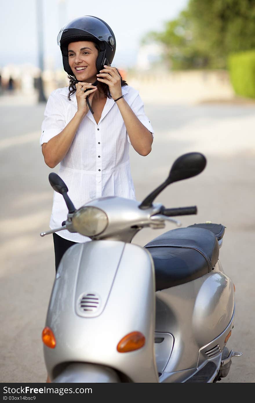 Woman Takes Off Her Helmet