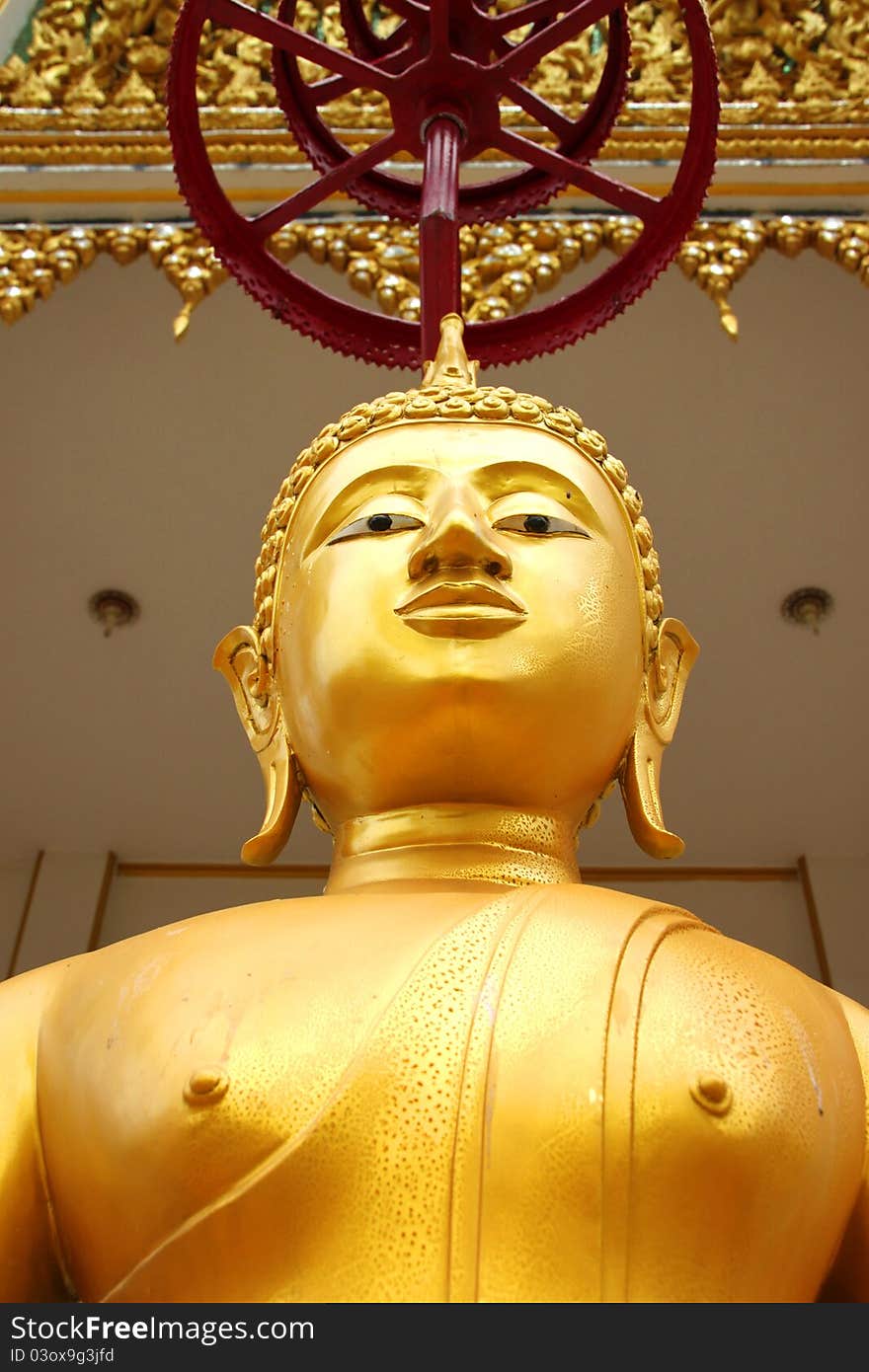 Buddha image in front of church, Wat Naga Wichai, Mahasarakam, Thailand