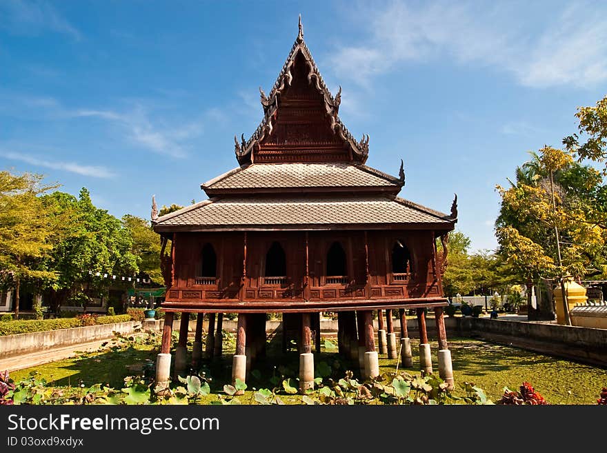 Wooden buddhist church in the lake