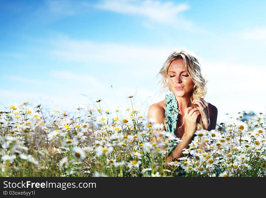 Girl On The Daisy Flowers Field