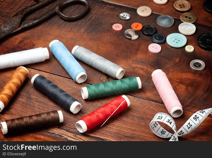 Vintage set of threads, scissors and buttons