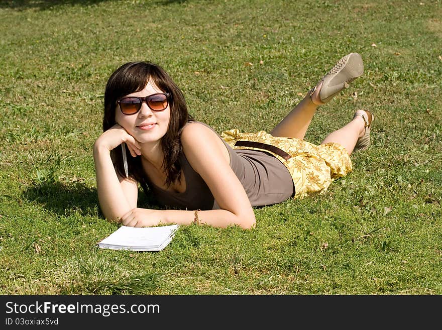 Girl Lying On Grass