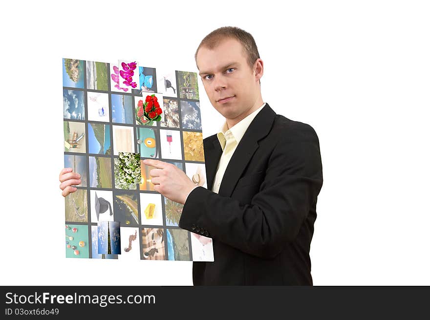 Young man in suit holding multimedia tablet, and choosing options, on white background. Young man in suit holding multimedia tablet, and choosing options, on white background