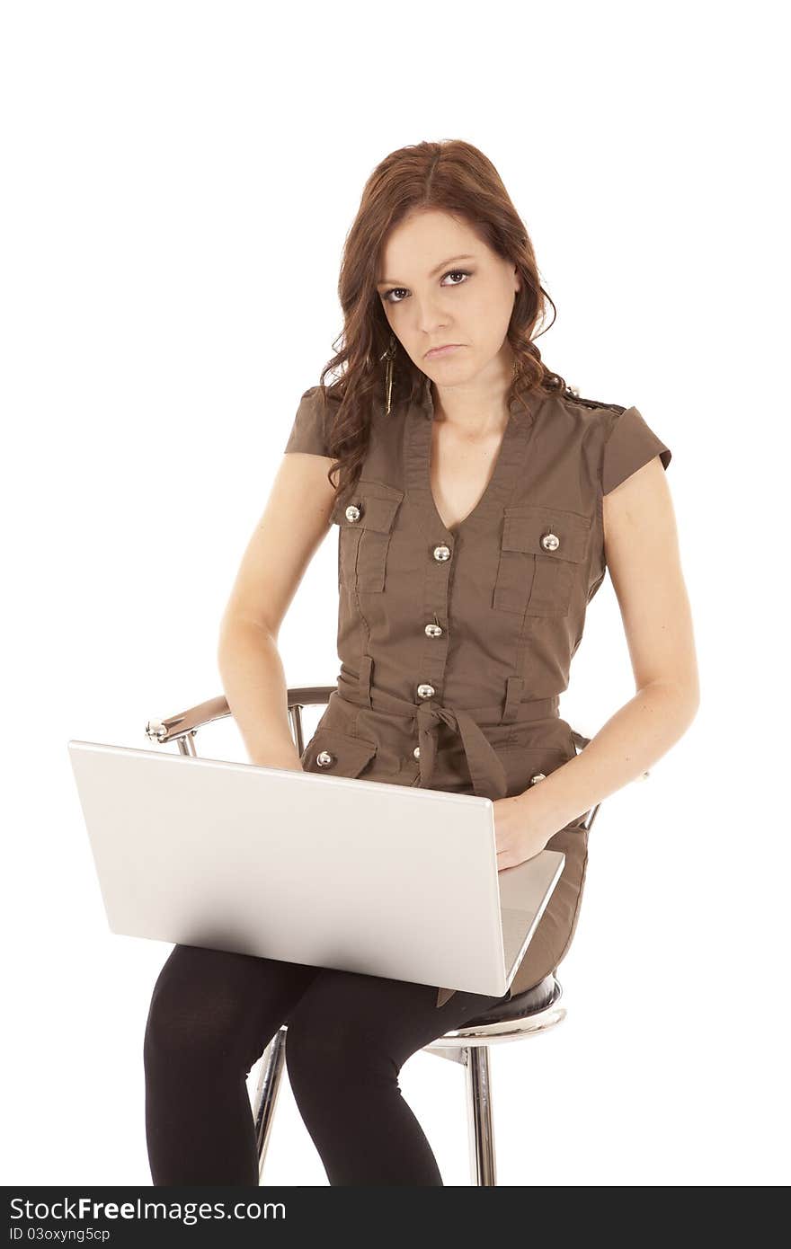 Woman brown shirt laptop sad