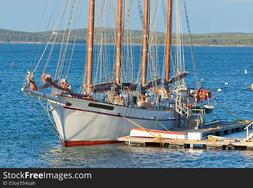 Antique sailboat moored at the pier.