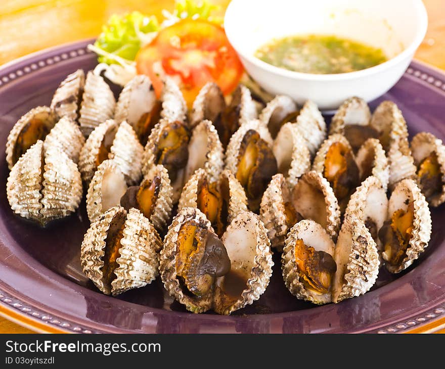 Grilled cockle with spicy sauce, seafood menu