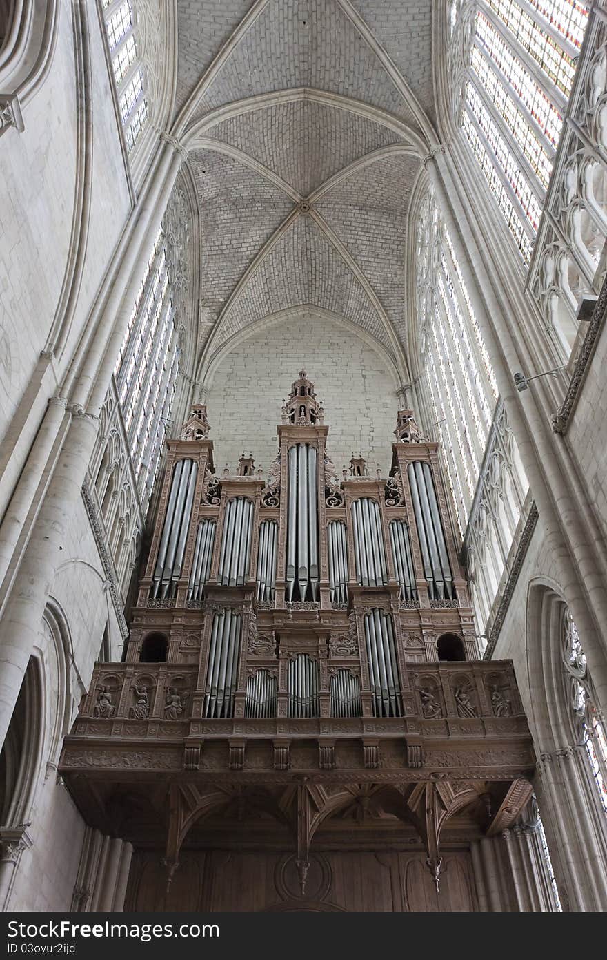 Old wooden organ in a french gothic cathedral.