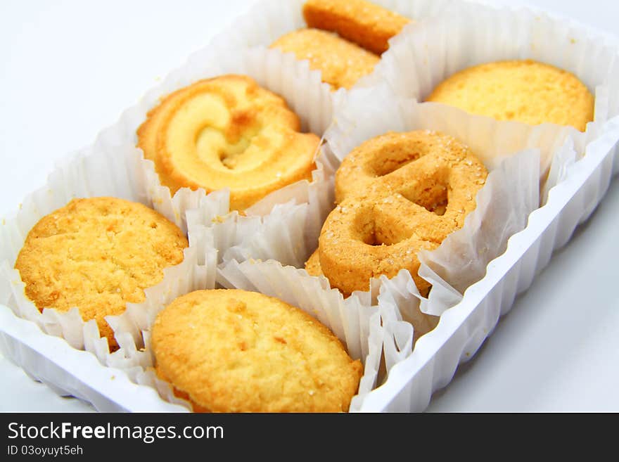 Variety of assorted tea time biscuits isolated on a white background