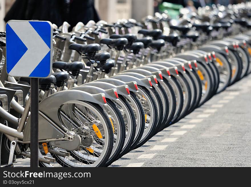 Row of bicycles on the parking. Photo with tilt-shift lens. Row of bicycles on the parking. Photo with tilt-shift lens