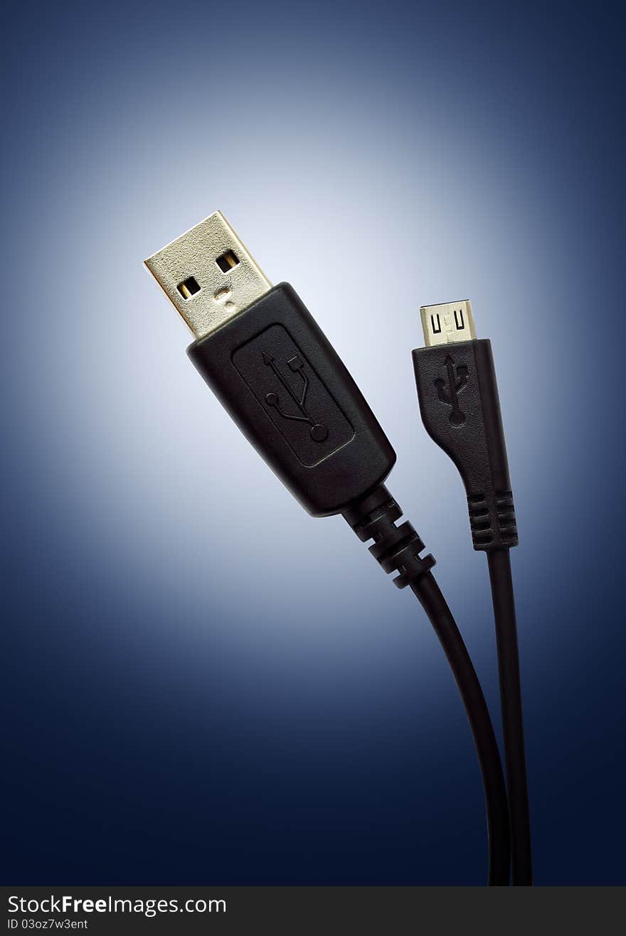 Two USB Cable On Blue Background