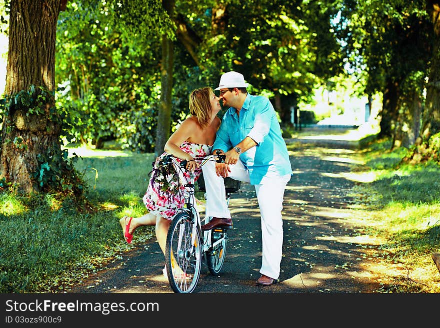 Middle aged couple flirting in a park