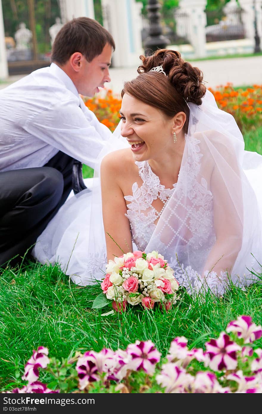 Happy bride and groom having fun