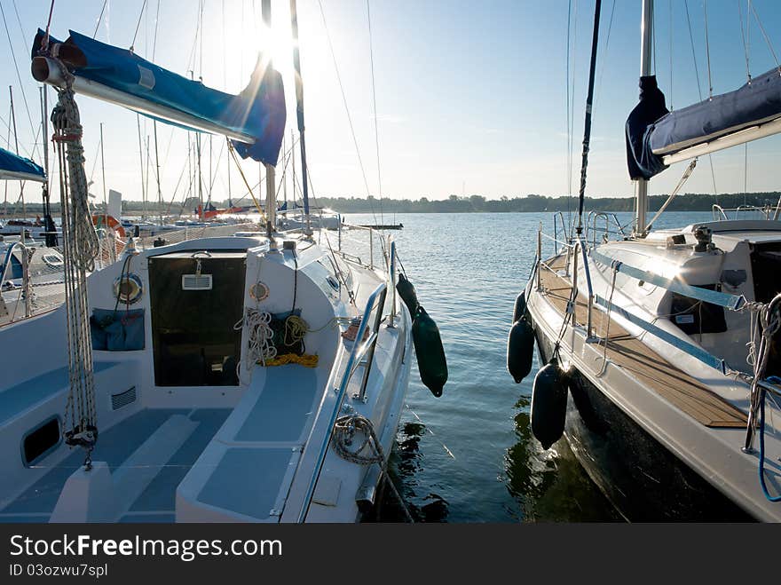 Yachts on an anchor in harbor, boats series