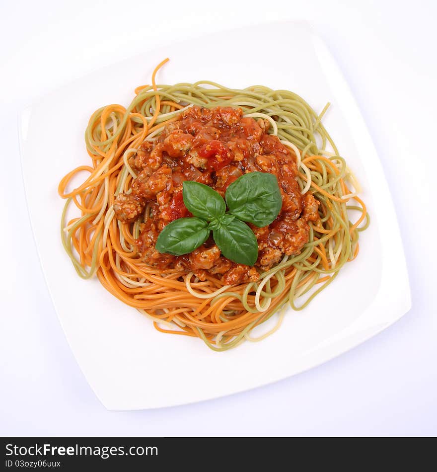 Colorful Spaghetti bolognese on a plate