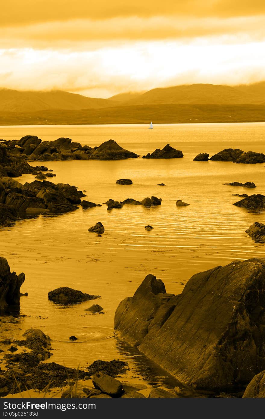 Scenic view in kerry ireland of lone yacht sailing in. Scenic view in kerry ireland of lone yacht sailing in