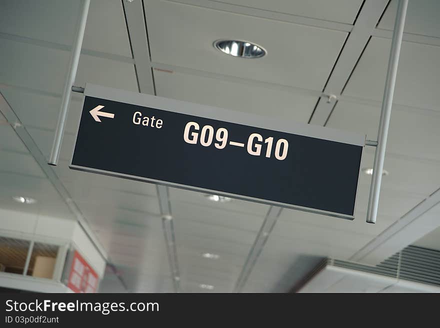 Gate sign in an airport in an airport terminal