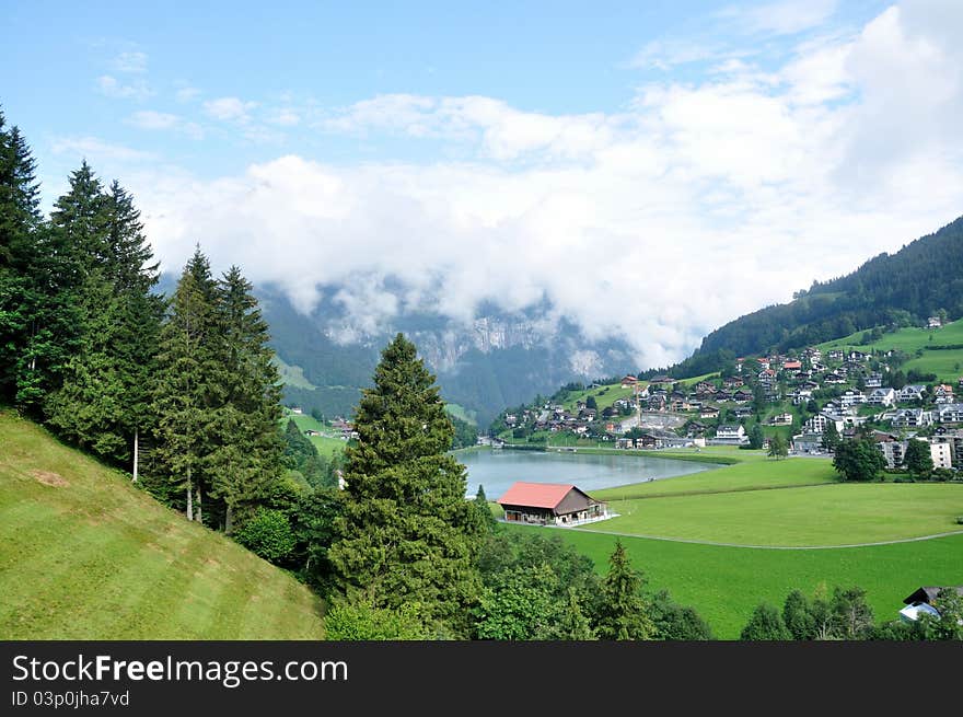 Swiss Landscape at the foot of Alps near mountain Titlis and village Engelberg