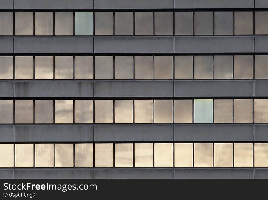 A pattern of windows in a modern office block