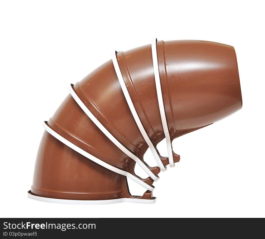 Brown plastic cup on a white background