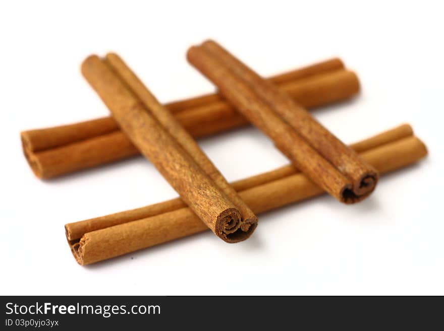 Cinnamon sticks on white