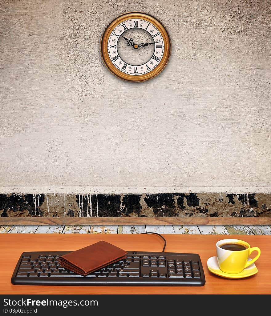 Room interior-keyboard on desk and a business clock on old wall. Room interior-keyboard on desk and a business clock on old wall