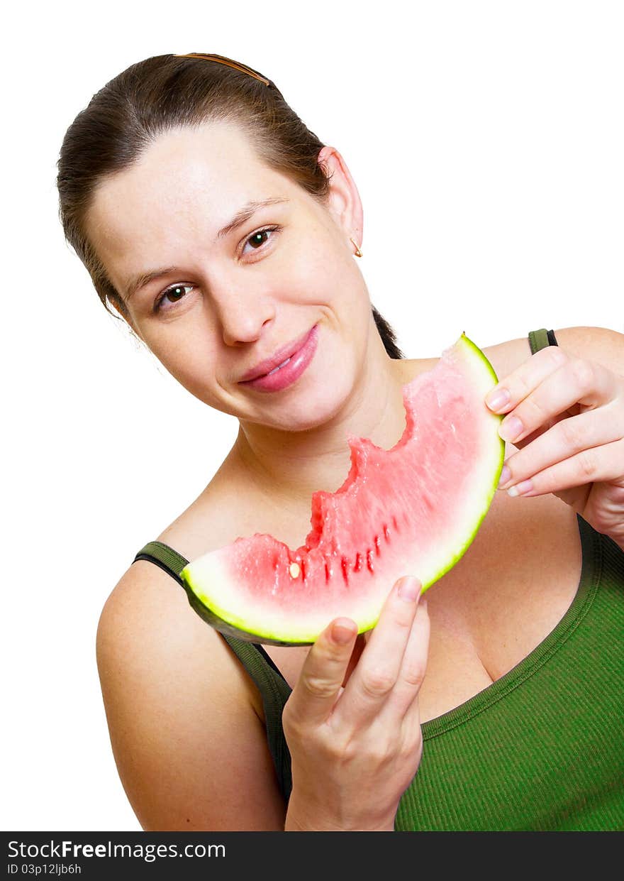 Beautiful young woman eat juicy watermelon. over white