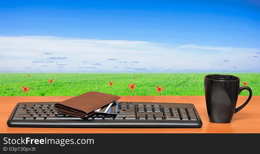 Keyboard on a table in the field.