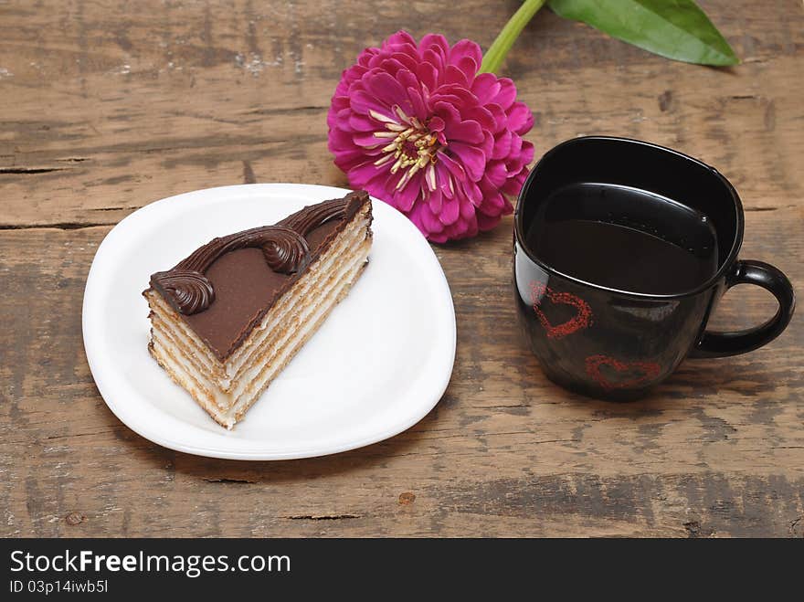 Tea with cakes on wood table