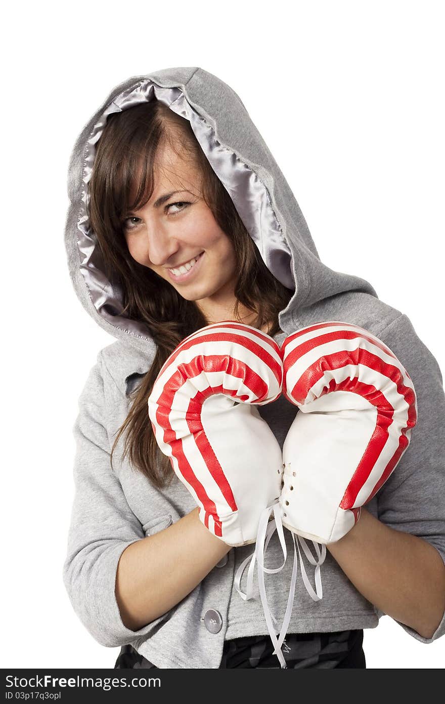 Girl shows a heart with boxing gloves. Girl shows a heart with boxing gloves