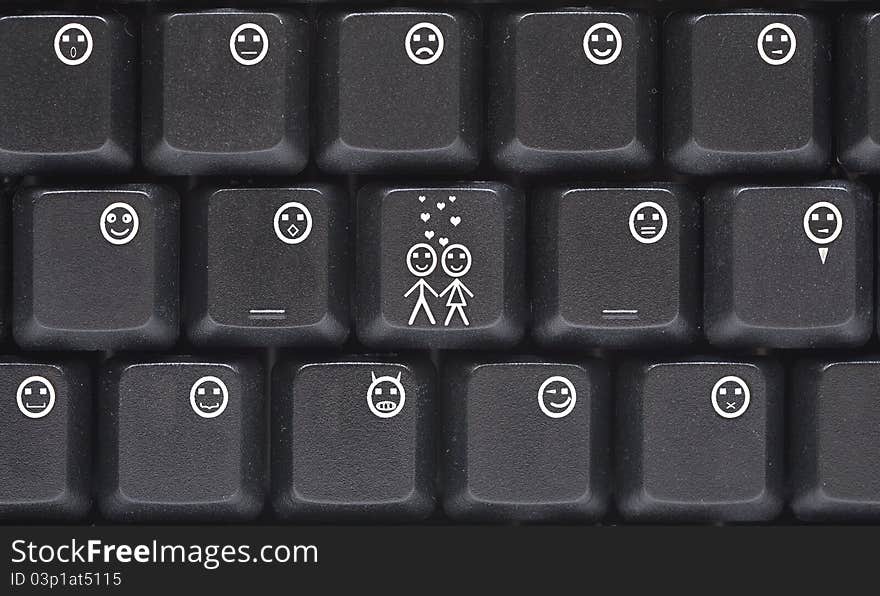 Computer keyboard closeup with smiley buttons. Computer keyboard closeup with smiley buttons