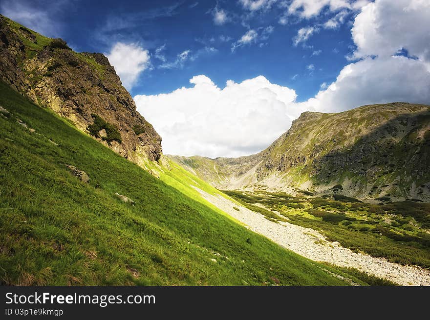 Mountain side with green grass