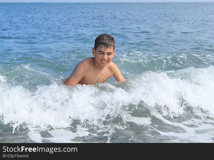 Boy In The Sea