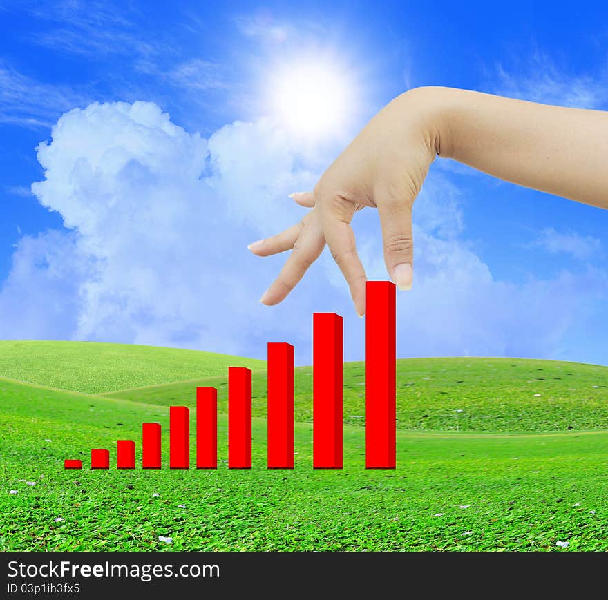 Hand pulling up a bar from a graph. Hand pulling up a bar from a graph