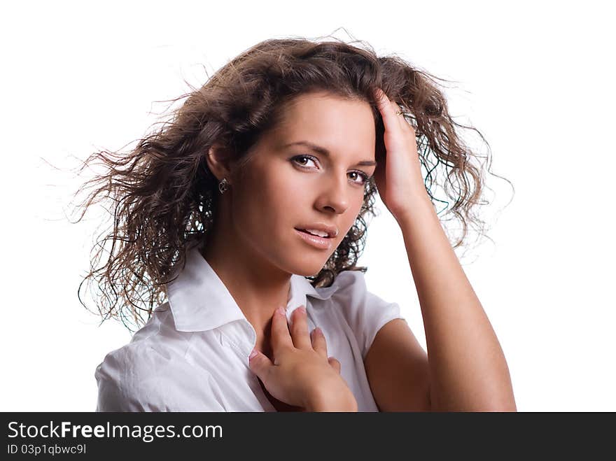 Beautiful brunette with gorgeous curly hair isolated on white background