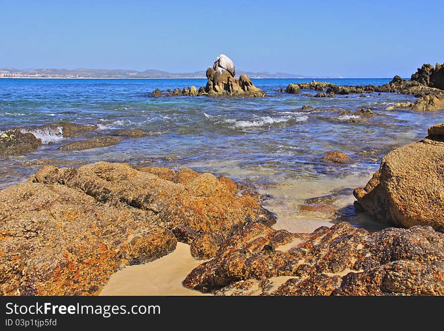 Deserted rock filled sandy beach in Cabos. Deserted rock filled sandy beach in Cabos