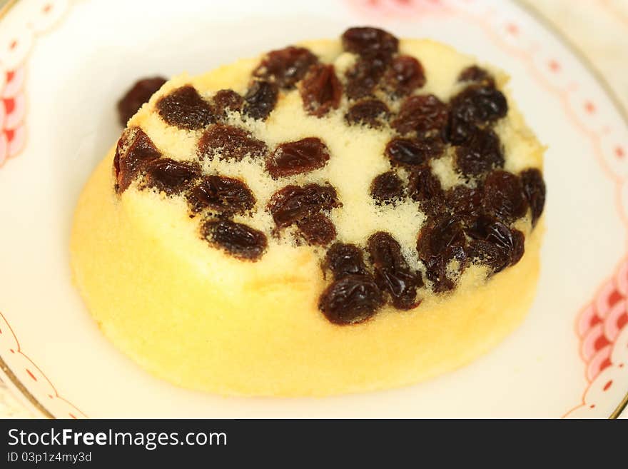 Plate with fruit cake in the morning light