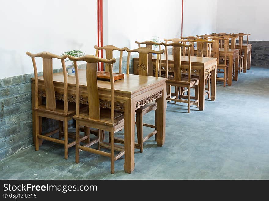 Chinese wooden tables and chairs interior in a restaurant