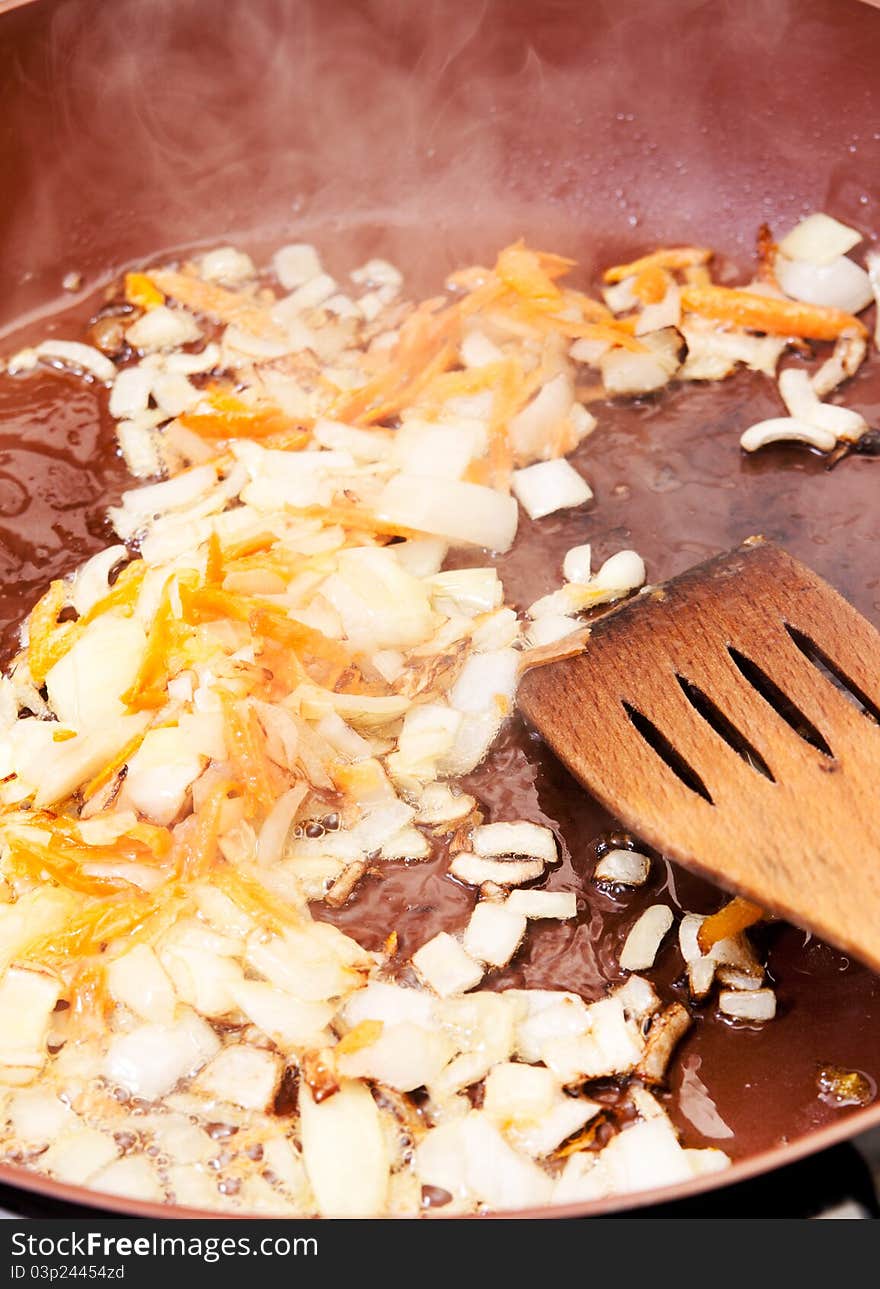 Onion And Carrot In A Roasting Pan