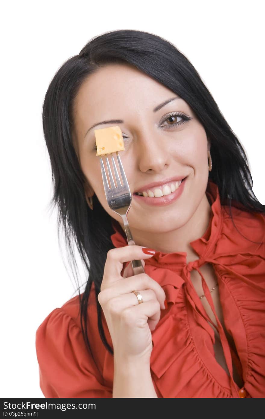 Attractive brunette in red, with a delicious slice of cheese on a fork. Attractive brunette in red, with a delicious slice of cheese on a fork