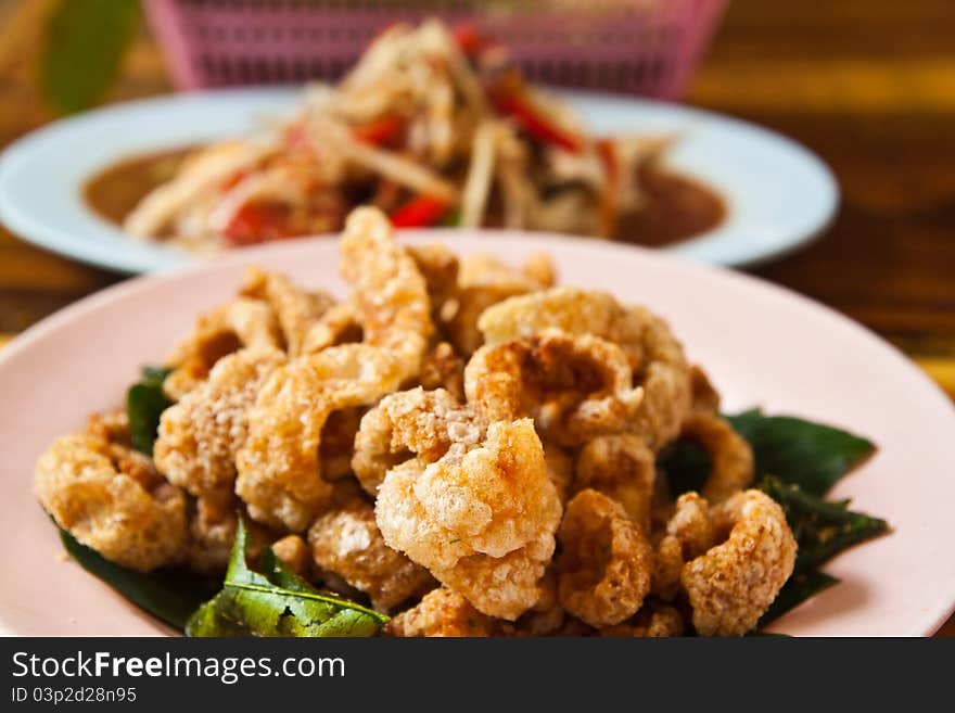 Crispy pork salted rind with thai herbal